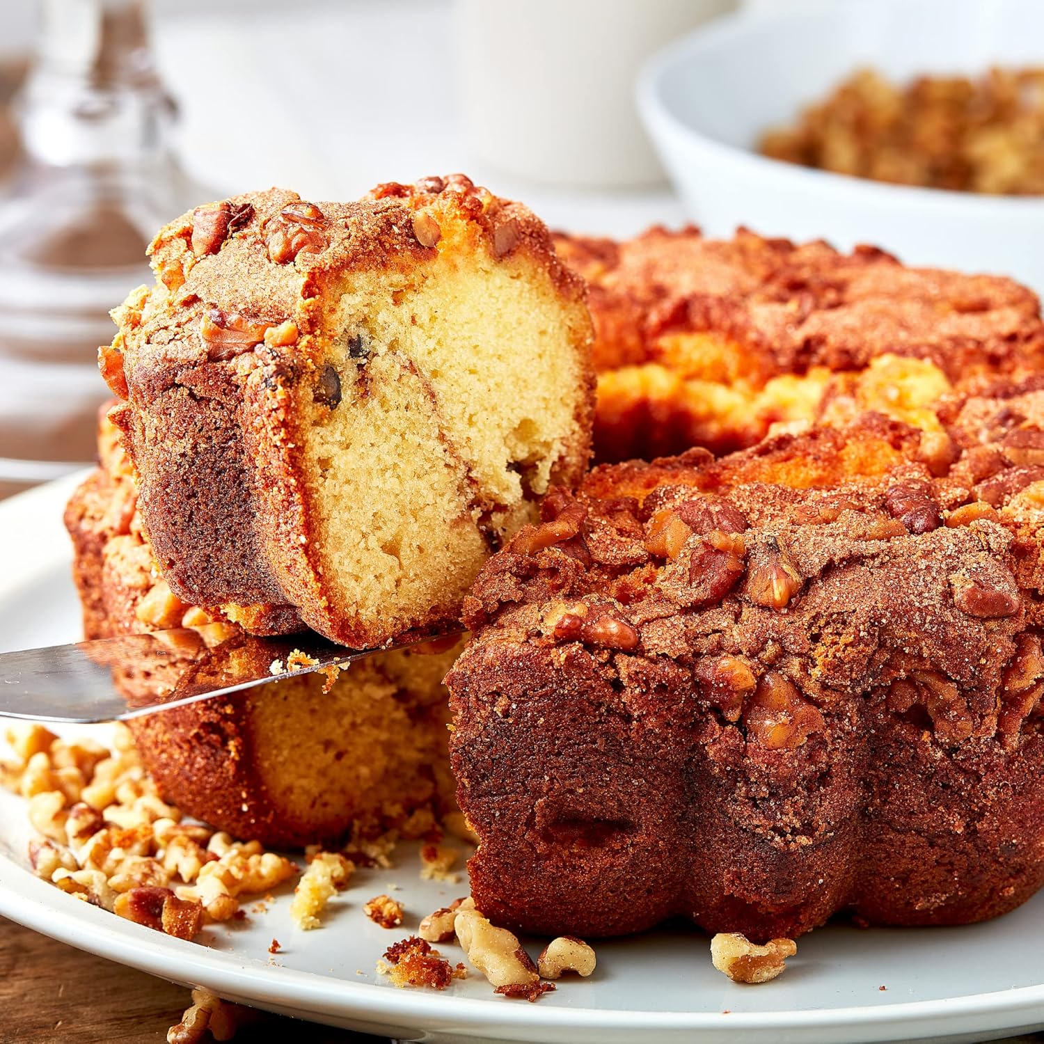 Miss Ellie's Cinnamon Walnut Coffee Cake sliced showing double layers of walnut streusel.